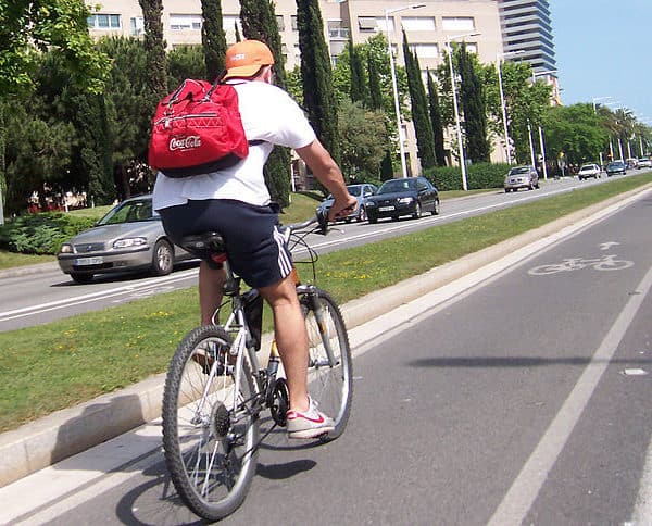Bicycle rider on Bike path, in Barcelona.