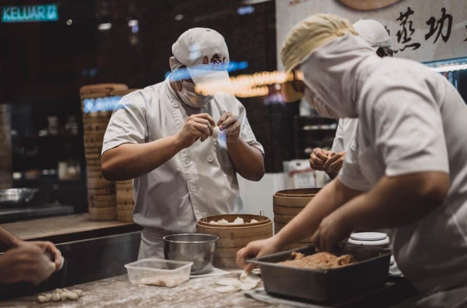 Two chefs in the kitchen by Chinh Le Duc - Unsplash