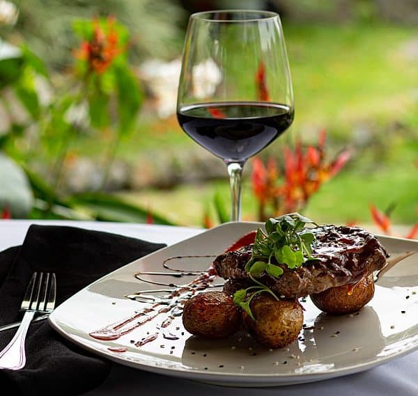 Pork rib dinner with potatoes and red wine