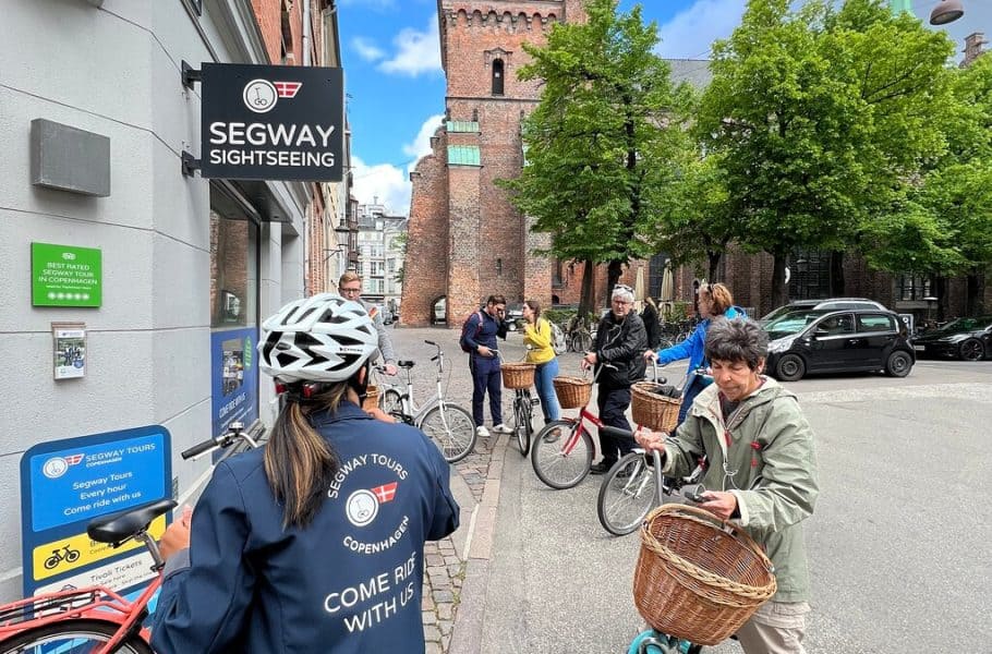 A small group goes on a bike tour.